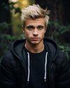 young-man-with-blonde-hair-black-jacket_893012-63588.jpg