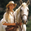sparklemarkle_young_woman_standing_holding_the_reins_of_a_white_8f20601f-5f9b-42b5-b302-3effe1...png