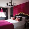 Pink-Bedroom-Chandelier-Glass-Window-Black-Curtain.jpg