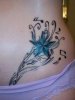 Nautical-Star-And-Music-Notes-Tattoo-On-Hip.jpg