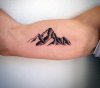 mountain-tattoo-designs-for-men-on-bicep.jpg