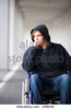 austria-mondsee-young-man-sitting-on-wheelchair-at-subway-cr6b4m.jpg