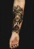 lion forearm tattoo.jpg