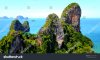 stock-photo-rock-spires-on-tropical-island-with-beach-aerial-overhead-view-railay-beach-thaila...jpg