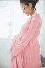 45094121-Asian-pregnant-happy-Woman-standing-&-smiling-look-at-her-tummy.jpg
