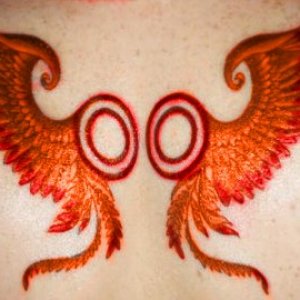 Her tattoo/wing portal
