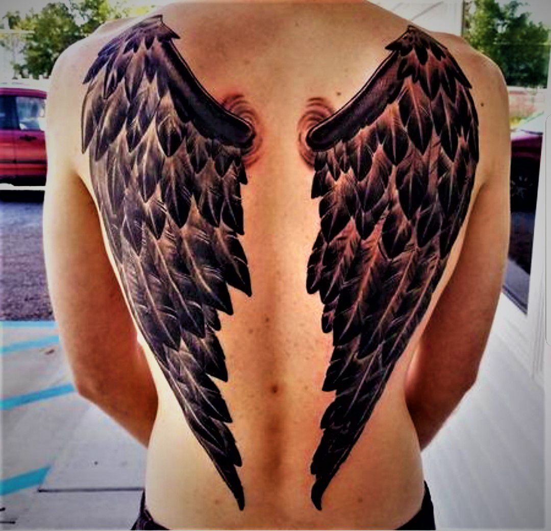Angel wing back tattoo