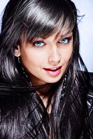 12933887-black-hair-young-woman-with-beautiful-big-blue-eyes-portrait.jpg