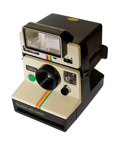 polaroid-land-camera-1000-q-light-electronic-flash-three-quarter-view-by-timmy-toucan.jpeg