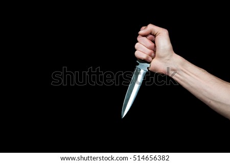 stock-photo-hand-of-a-man-holding-dagger-knife-isolated-on-a-black-background-514656382.jpg