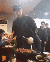 johnny storm cooking dinner GIF