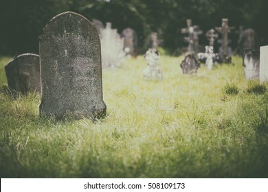 tombstone-graves-ancient-church-graveyard-260nw-508109173.jpg