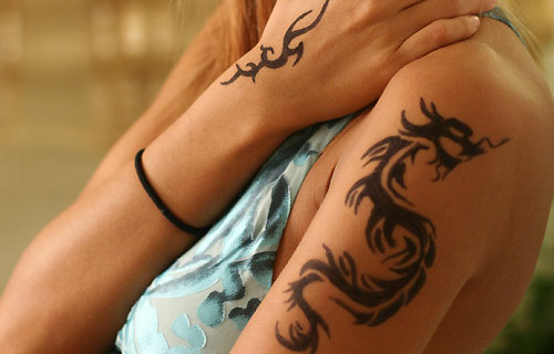 dragon-cool-tattoo-ideas-for-women-on-sleeve.jpg
