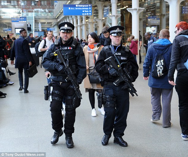 327378CE00000578-3504874-In_London_Armed_officers_make_their_way_through_the_Eurostar_ter-a-30_1458673954935.jpg