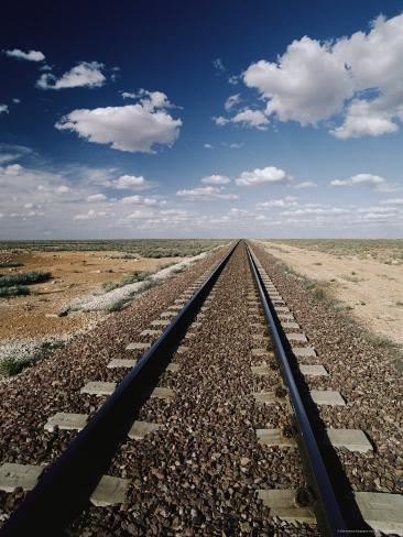 trans-continental-train-tracks-and-clouds-on-the-nullabor-plain.jpg