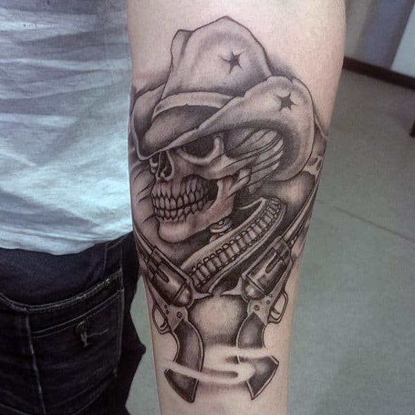 black-and-grey-western-tattoo-with-rifles-on-man.jpg