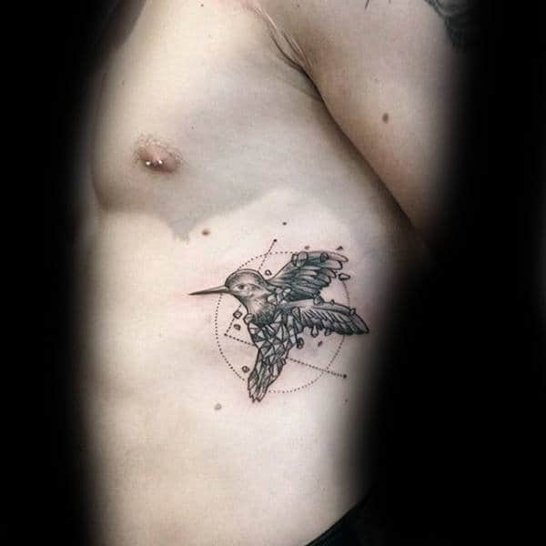 geometrical-hummingbird-rib-cage-side-tattoo-on-man.jpg