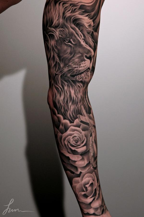 78-Lion-and-flowers-full-sleeve-tattoo.jpg