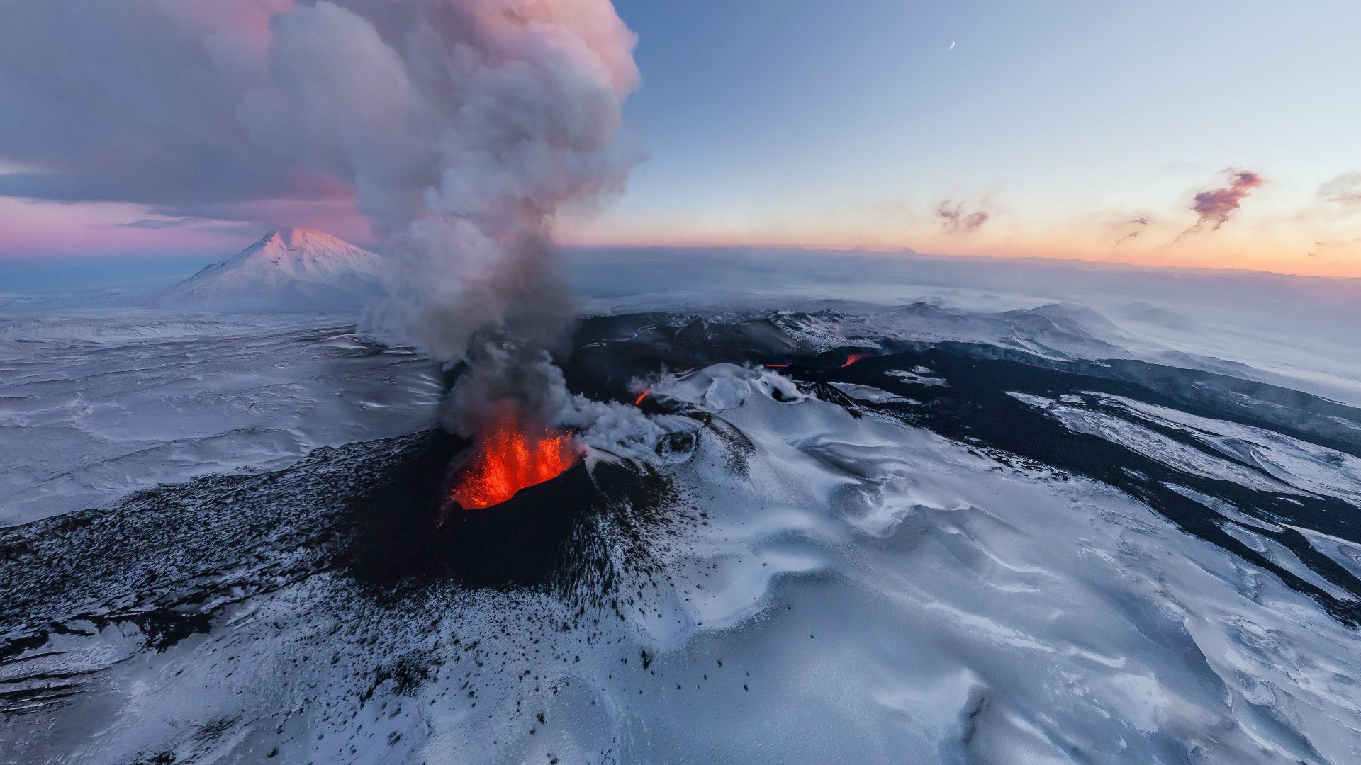 Nature___Volcanoes_Red_lava_among_the_snow-capped_peaks_099808_.jpg
