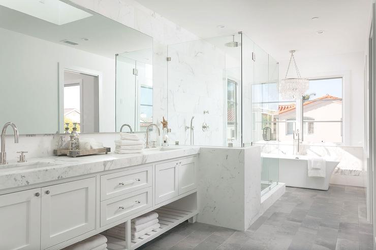 white-bathroom-gray-tiled-floor-white-capiz-chandelier-over-rectangular-tub.jpg