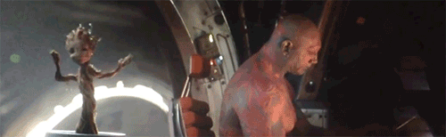 mini-groot-groot-dancing-stops-when-drax-looks-guardians-of-the-galaxy-1407834029F.gif