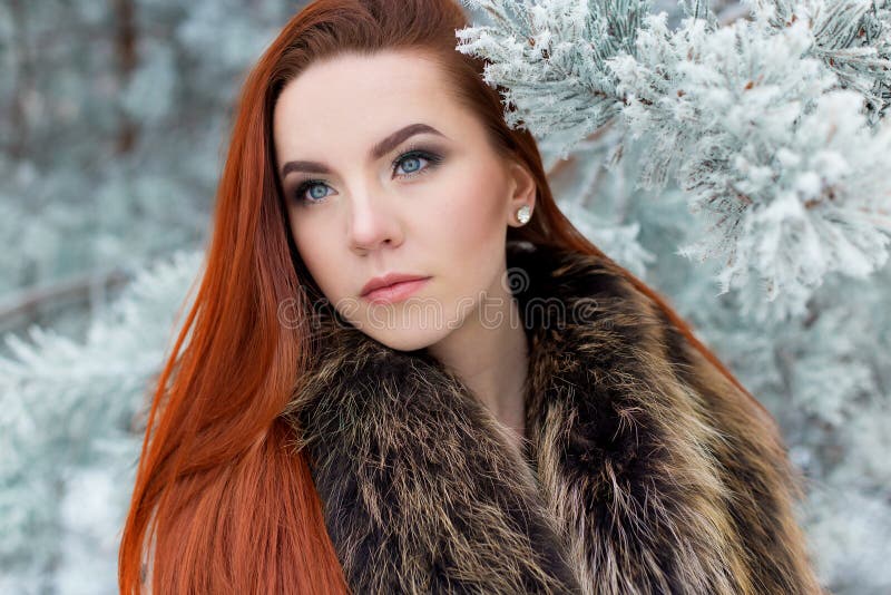 portrait-beautiful-cute-red-haired-girl-winter-forest-78508522.jpg