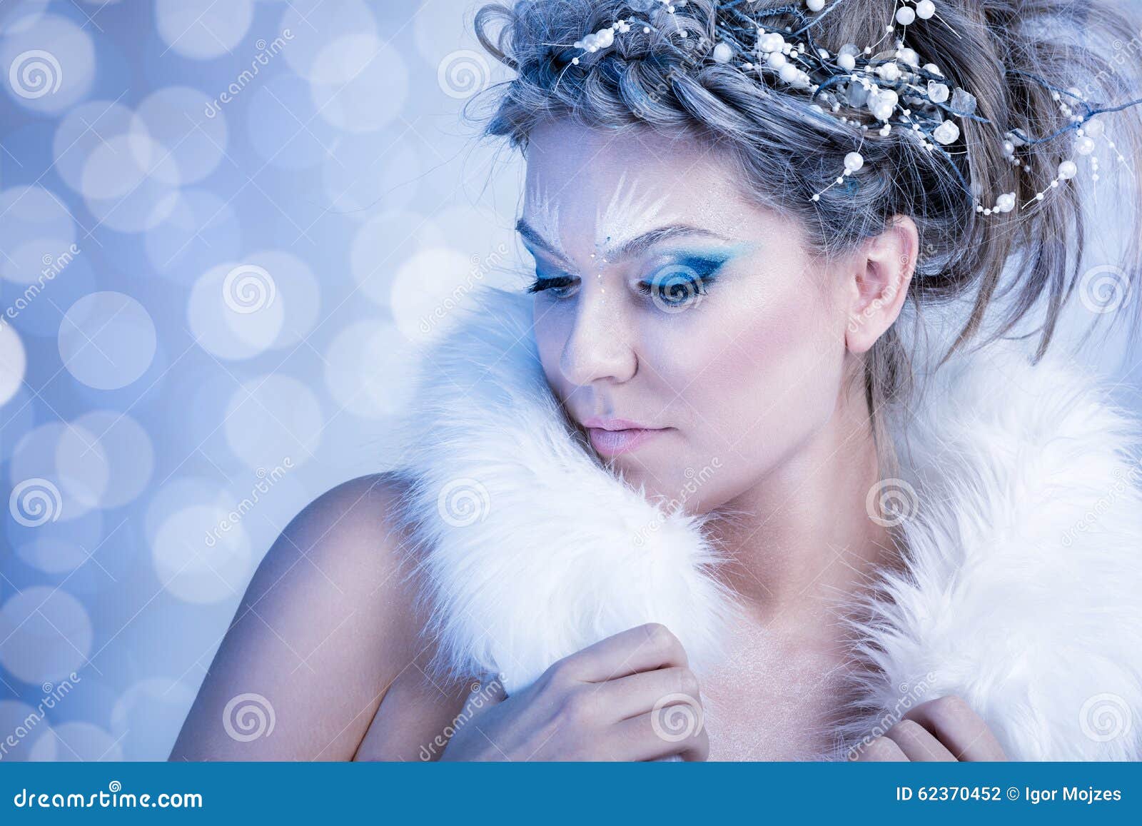 snow-queen-fur-over-winter-background-62370452.jpg