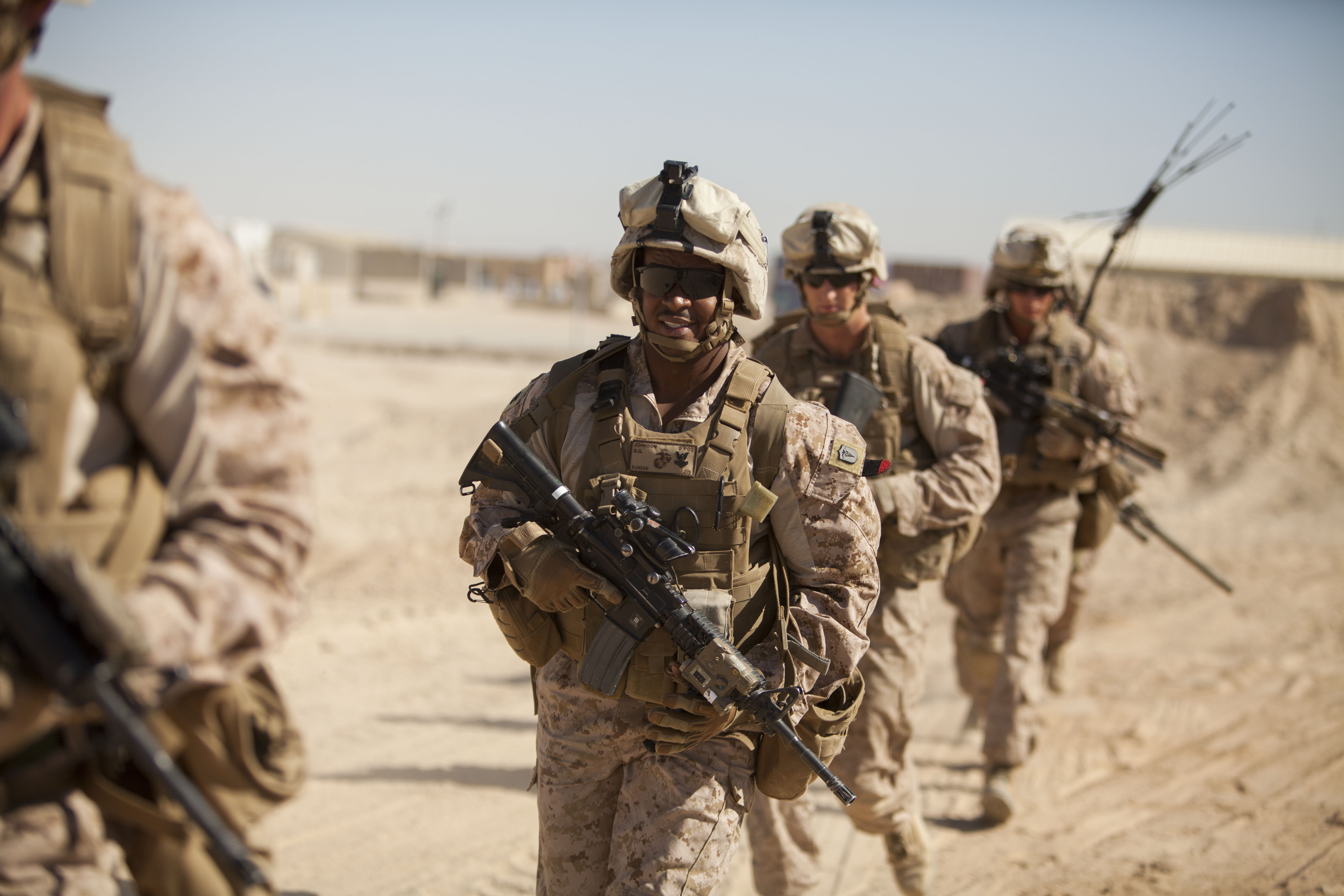 U.S._Navy_Hospital_Corpsman_2nd_Class_Branden_Johnson,_center,_assigned_to_the_Marine_Corps_Fox_Company,_2nd_Battalion,_8th_Marine_Regiment,_Regimental_Combat_Team_7,_participates_in_a_mission_rehearsal_at_Camp_130528-M-QZ858-096.jpg