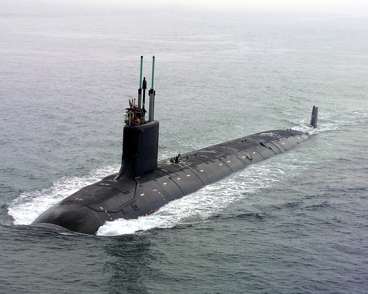 1200px-US_Navy_040730-N-1234E-002_PCU_Virginia_%28SSN_774%29_returns_to_the_General_Dynamics_Electric_Boat_shipyard.jpg